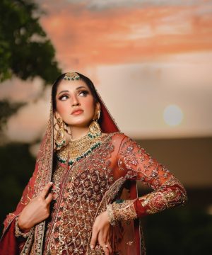 A beautiful woman in elaborate wedding attire.